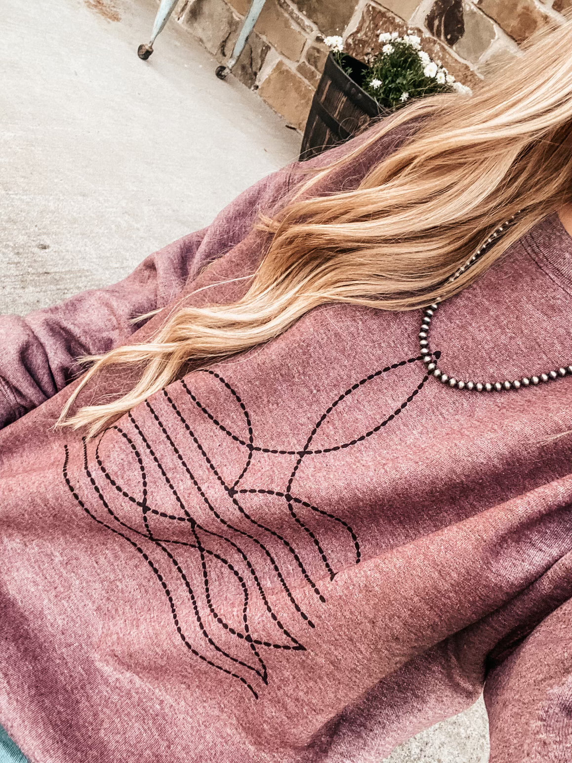Boot-Stitch on Maroon Sweatshirt