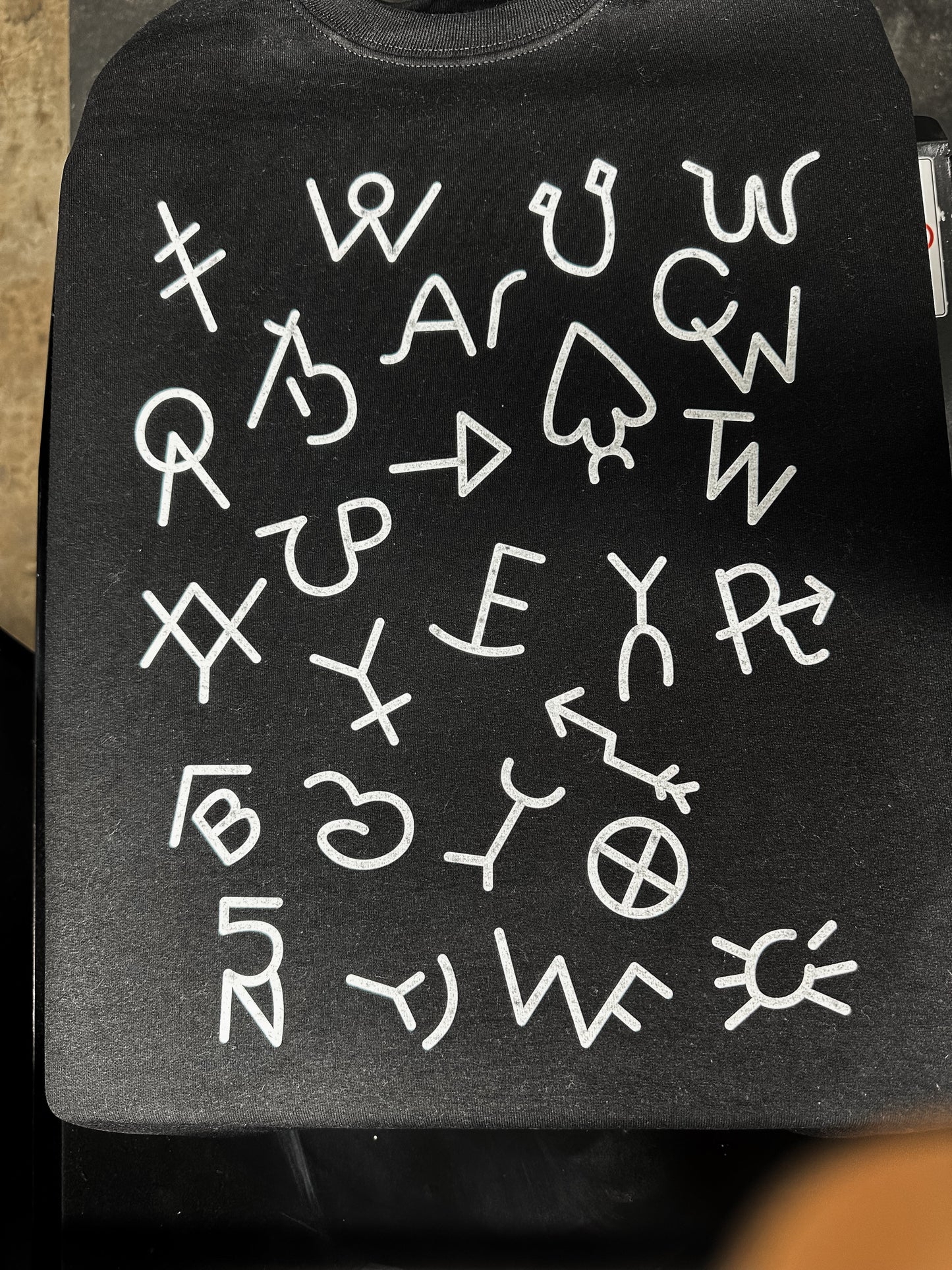 White Brands on Sweatshirt